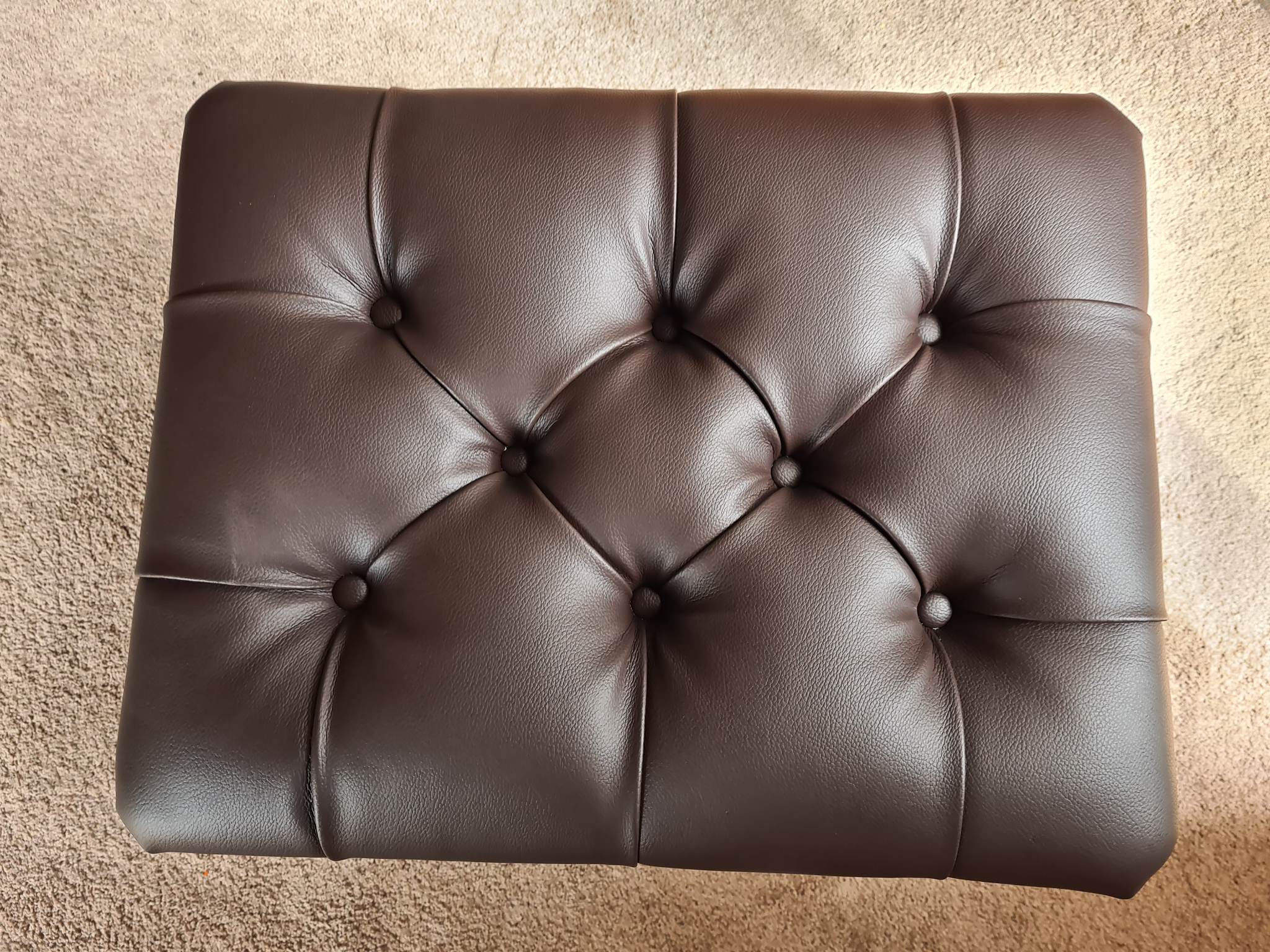 Custom upholstered chair in workshop